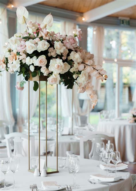 Create a breathtaking ambiance with elegant tall wedding centerpieces. Discover top ideas to elevate your reception decor and wow your guests.